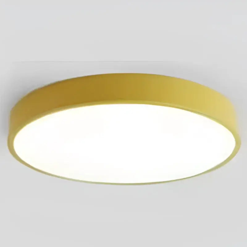 Yellow circular ceiling light with smooth modern design from decorbites colorful round led collection for bedroom decor