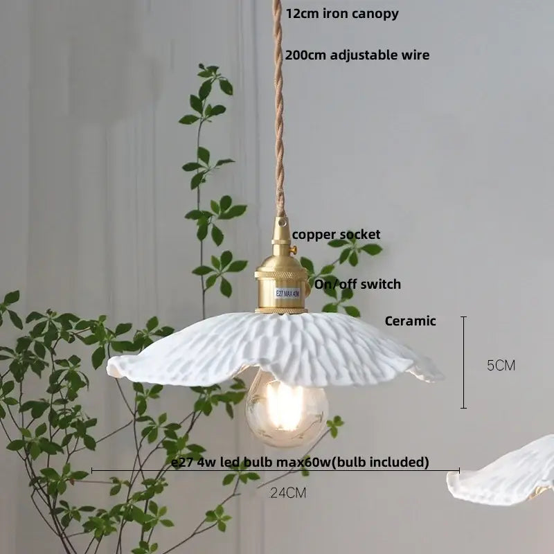 Minimalist white ceramic pendant light with fluted petal design and brass copper socket for dining room home decor decorbites led