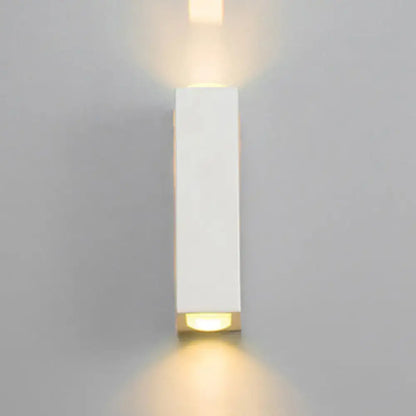 Minimalist white rectangle aluminum wall light with warm dual-directional lighting for bedroom use