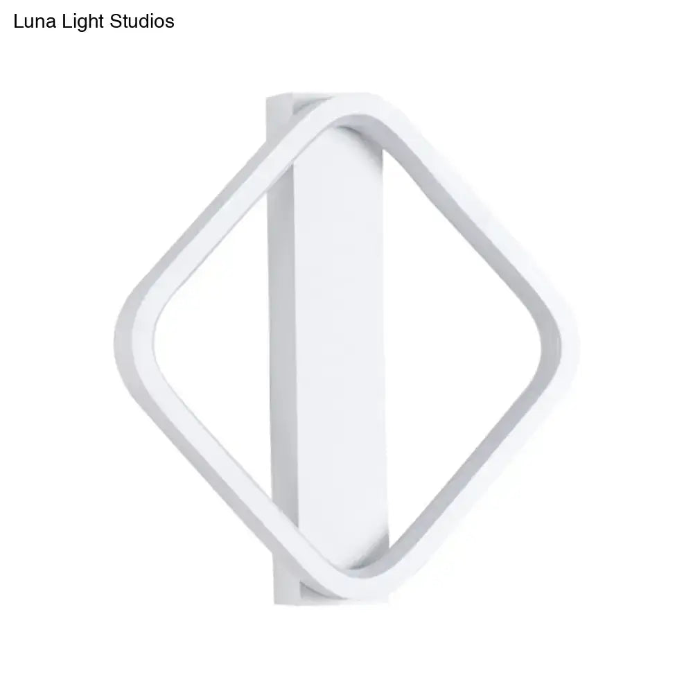 Minimalist white led wall sconce with round square design featuring a diamond-shaped sleek minimalist structure for bedroom lighting
