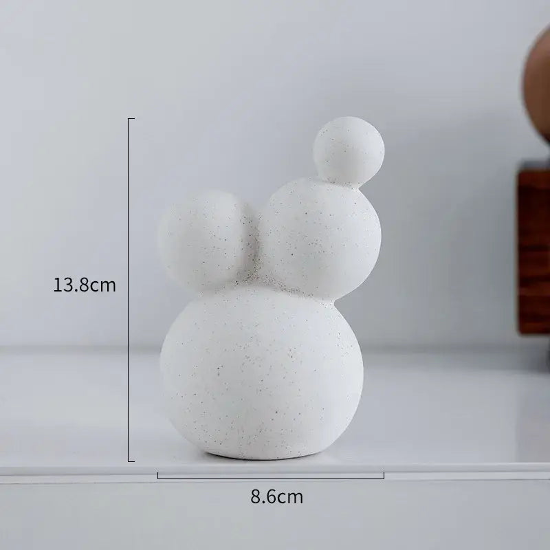 Minimalist white speckled geometric ceramic handicraft sculpture with three stacked spherical forms for living room decor