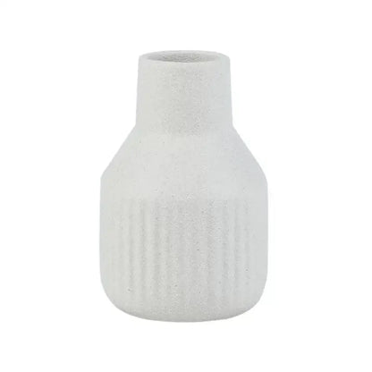Minimalist white decorbites ceramic vase with a textured ribbed body and narrow neck for dining room decor