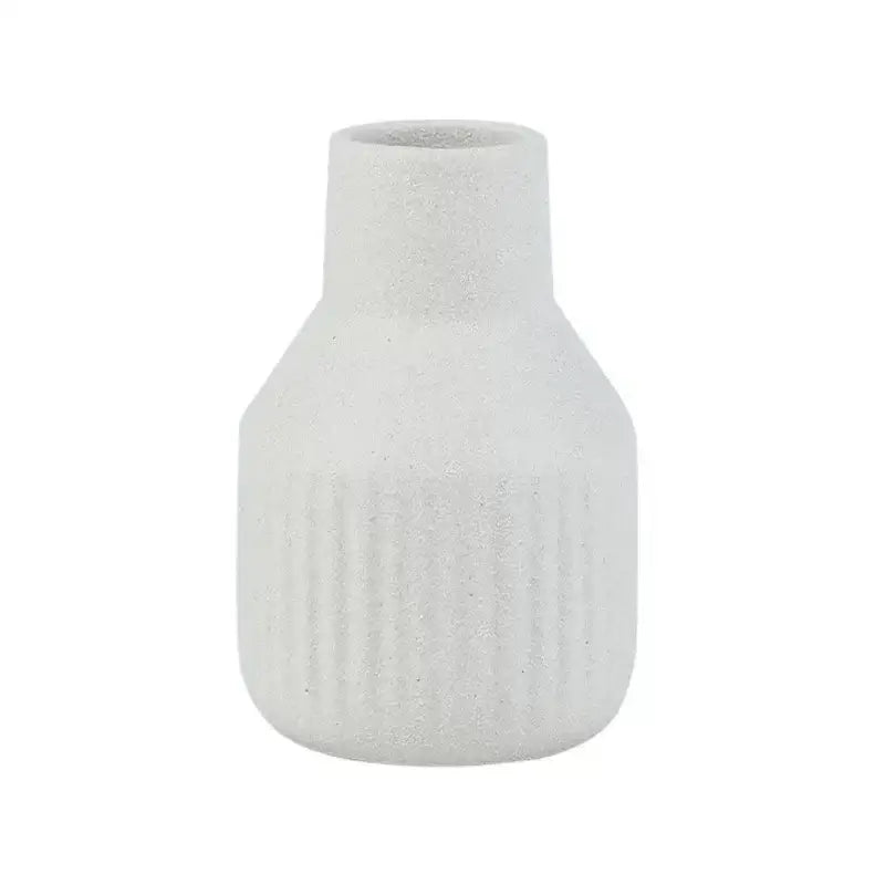 Minimalist white decorbites ceramic vase with a textured ribbed body and narrow neck for dining room decor