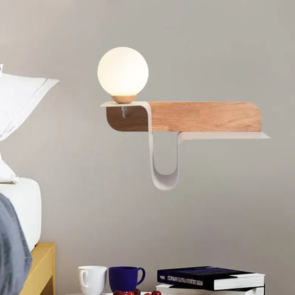 Minimalist white wall lamp with frosted glass shelf and wooden arm features frosted glass spherical led bulb