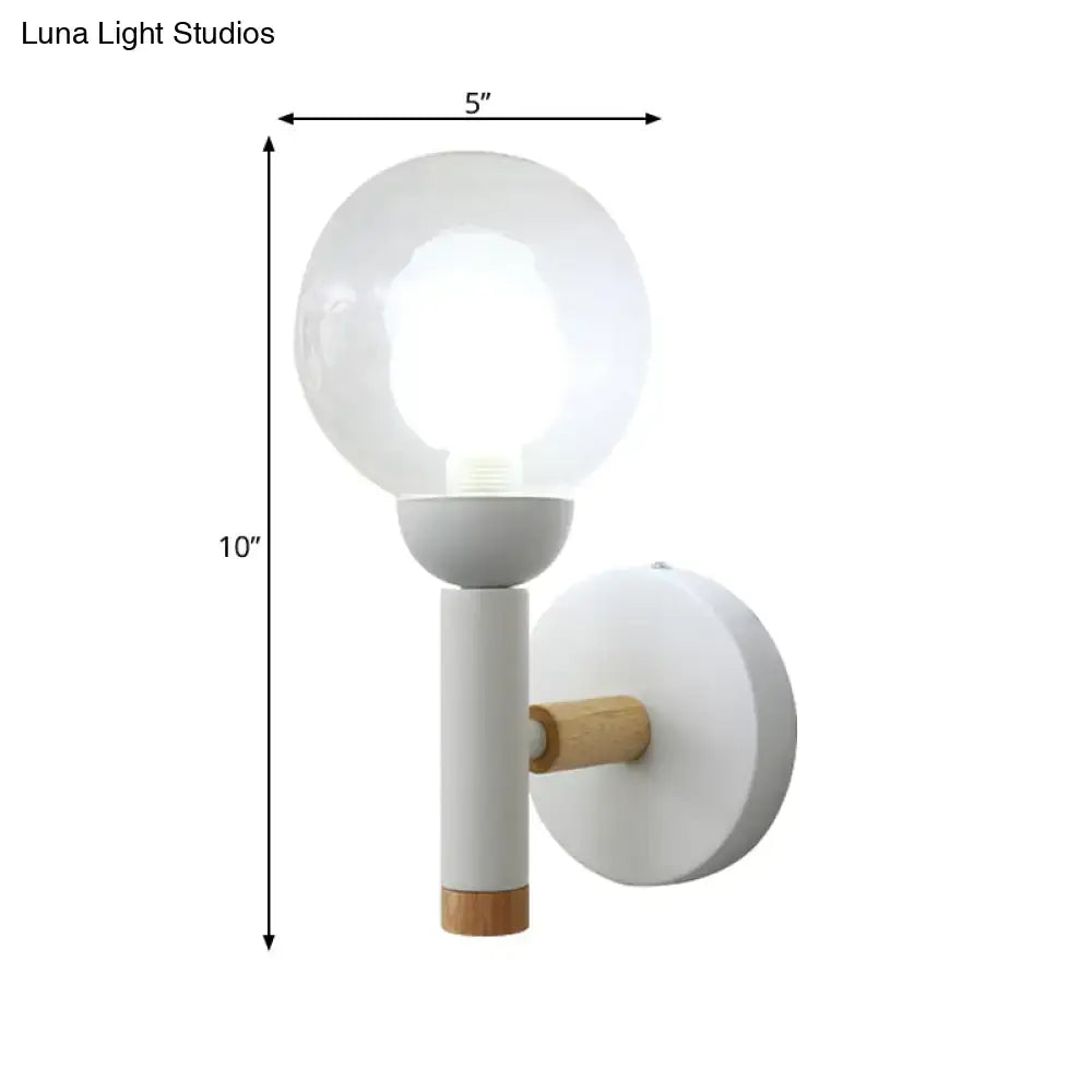Minimalist white and wood armed wall lamp with frosted glass globe and matte stem for 110v-120v bedroom use
