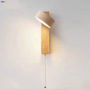 Minimalist wood and beige canopy led wall light with natural wood base and textured concrete shade for bedroom decorbites canopy led