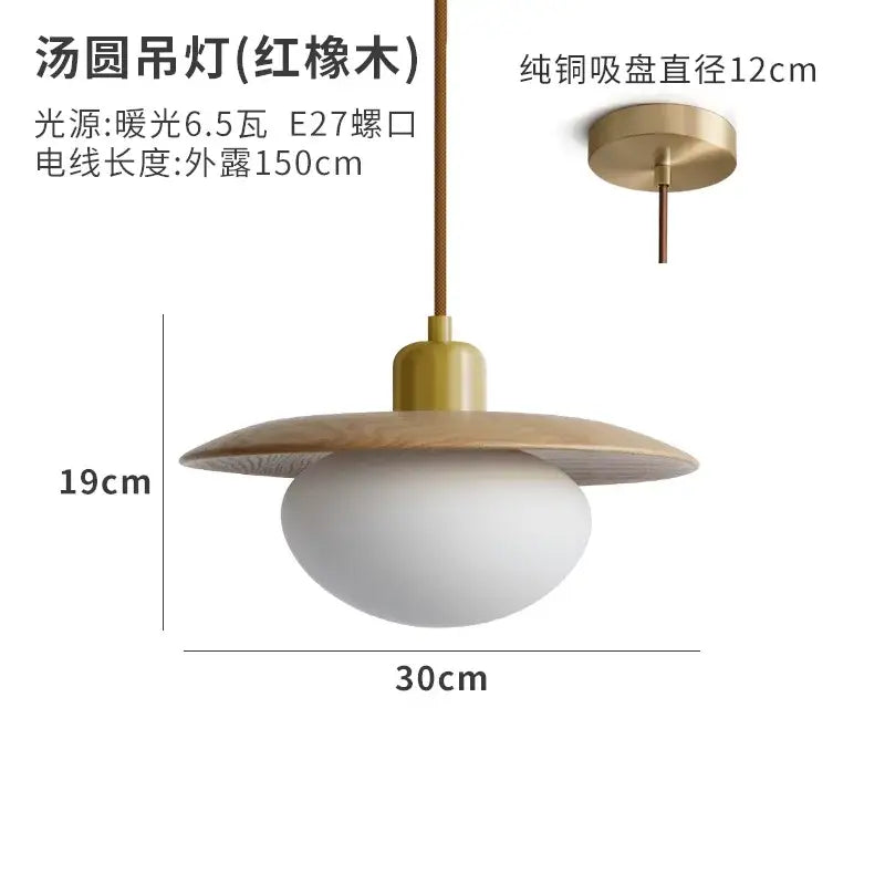 Minimalist wood and brass pendant light with warm red elm disc and frosted glass globe for dining room cream wind decorbites cream wind pendant