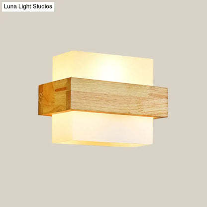 Minimalist wood and opal glass wall sconce with warm rectangular acrylic diffuser for ambient bedroom wall light