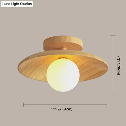 DecorBites™ sleek wooden ceiling light semi-flush mount with a warm glowing bulb and flat disc-shaped wood shade canopy width
