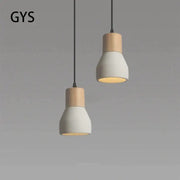 Minimalist wood and white ceramic pendant lamp with two-tone design suspended by black cords for bedroom decorbites cement concrete