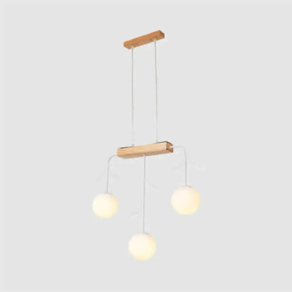 Minimalist wooden hanging lamp decorbites nordic bubble shade island with two wooden bars and three frosted globe bulbs