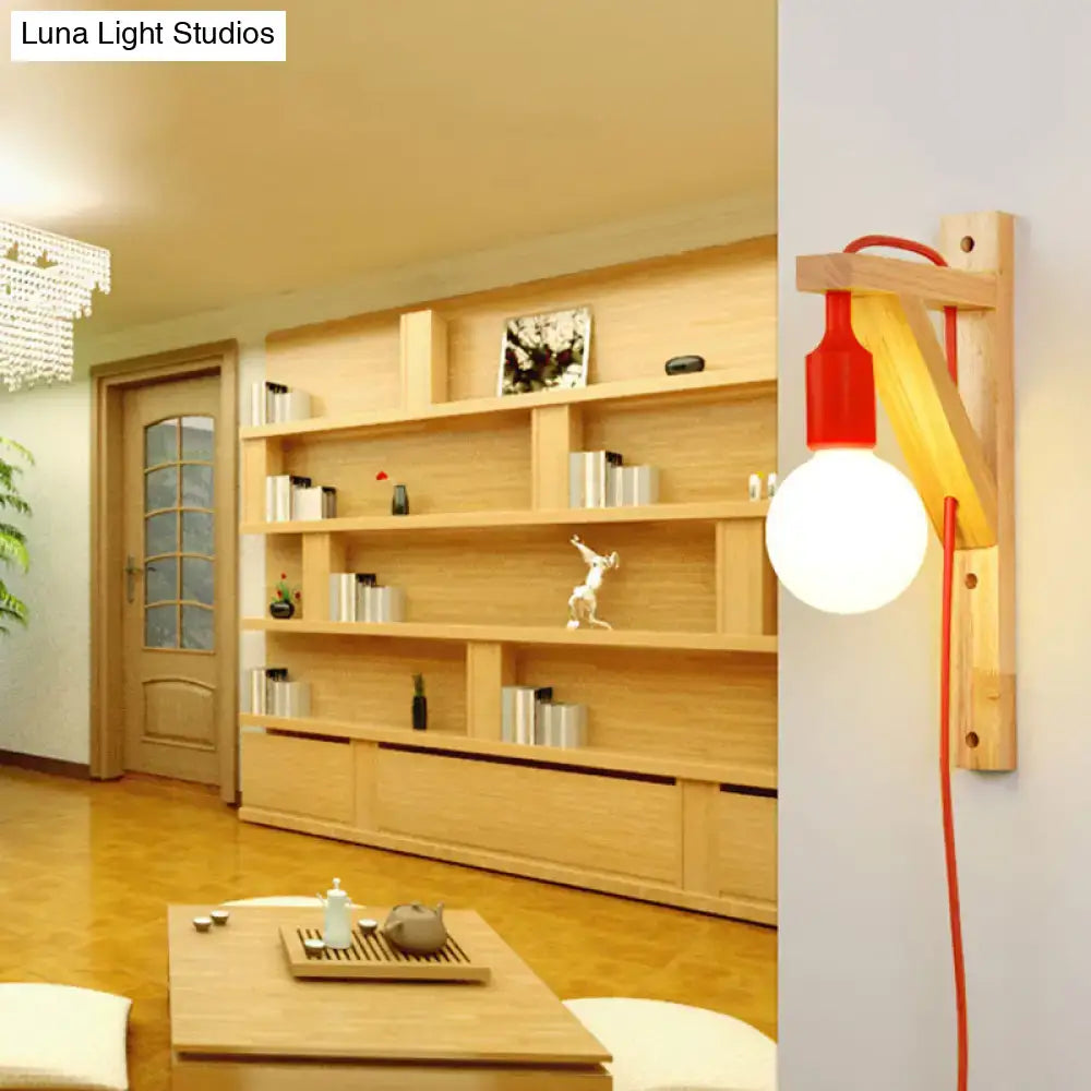 Minimalist red and natural wood wall sconce with spherical bulb and medium base e26 e27 for bedroom lighting