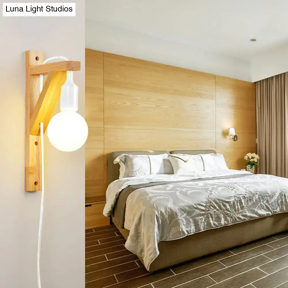 Minimalist wooden wall sconce with natural wood frame and clear glass bulb medium base wall lamp for bedroom use