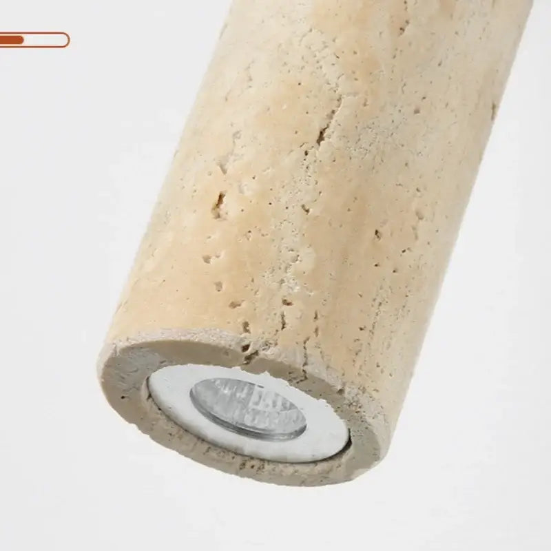 Beige textured concrete cylindrical pendant light with recessed led bulb minimalist yellow travertine adjustable led wall sconce decorbites