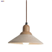 Minimalist pendant light with beige speckled ceramic shade and yellow travertine stone fixture for dining room use