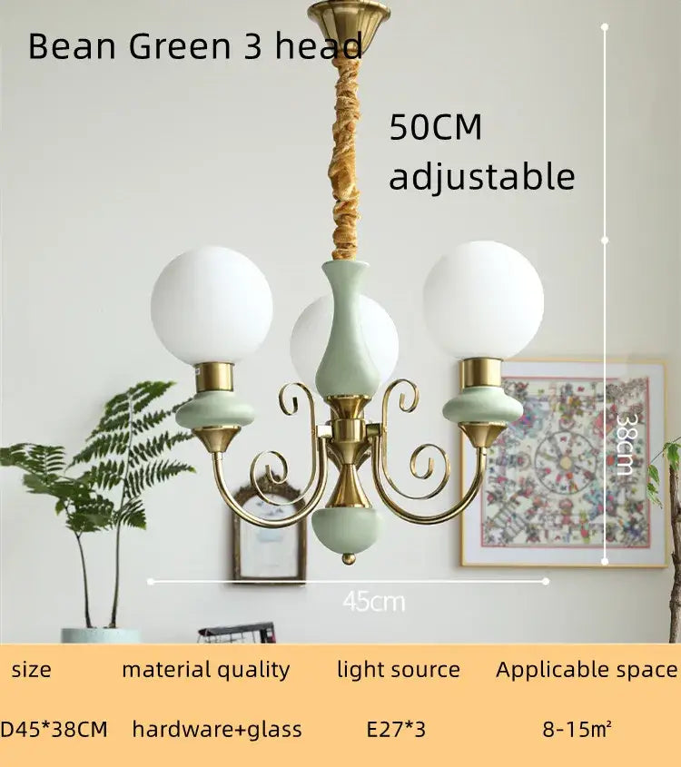 Bean green 3-head chandelier with brass accents and frosted glass globes in mint and gold cream style led decorbites cream style