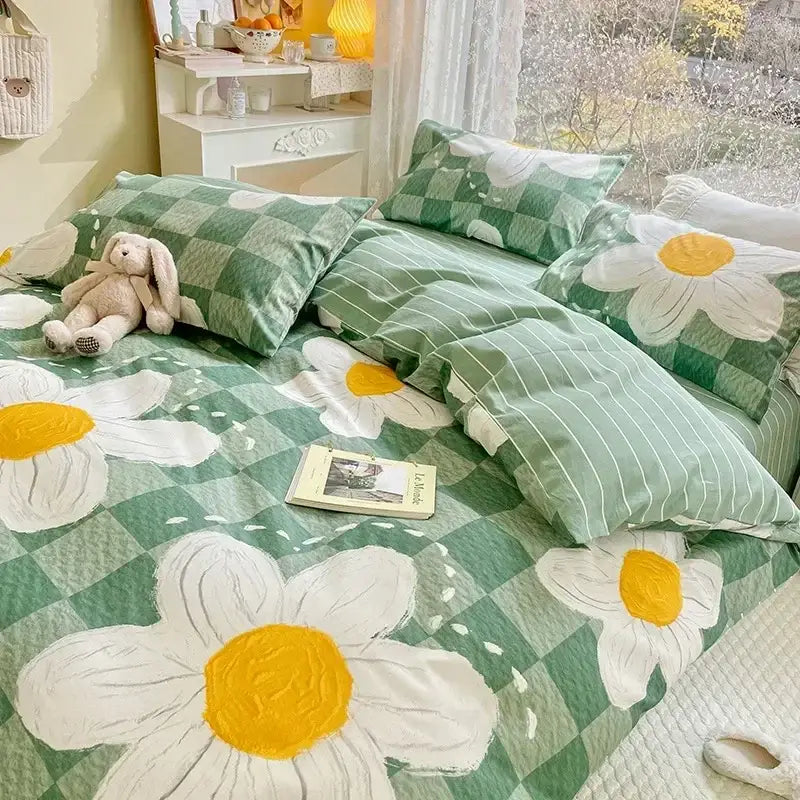 Mint and cream floral print cotton bedding set with green and white checkered duvet cover featuring large daisy prints