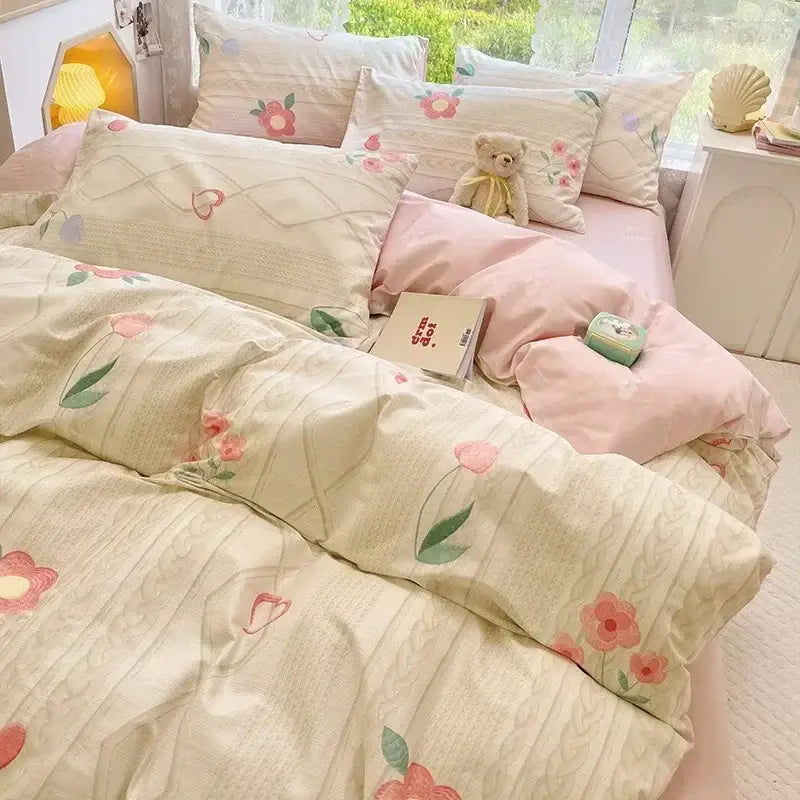 Pastel pink and cream floral print cotton bedding set with embroidered heart motifs for bedroom duvet cover use
