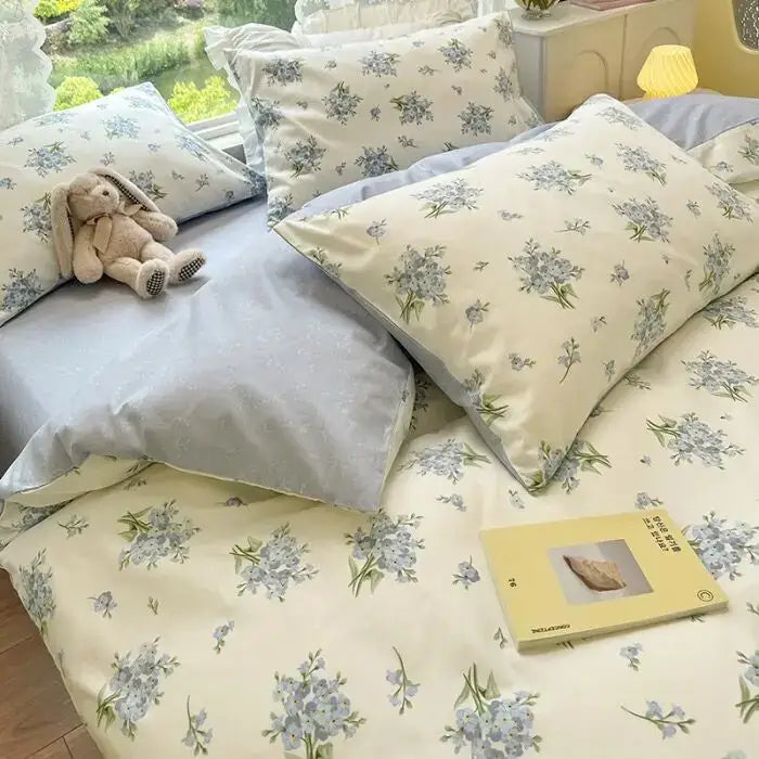 Cream-colored bedding set with delicate blue and green floral print cotton for a mint and cream floral print cotton bedroom