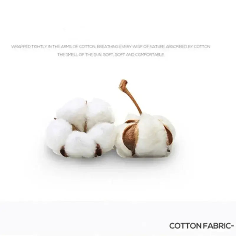 Two fluffy white cotton bolls with brown stems highlighting natural softness for floral print cotton bedding set