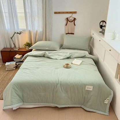 Mint green cotton summer cooling blanket with quilted design and subtle stitching decorbites cotton summer comforter