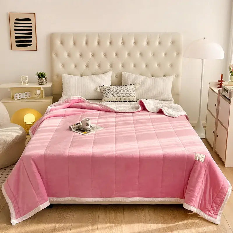 Pink quilted blanket with white trim and plush texture for cozy bedroom decor featuring decorbites cozy imitation lamb’s wool