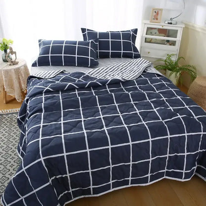 Navy blue and white grid patterned quilt set showcasing decorbites daisy print for bedroom diamond quilted bedding