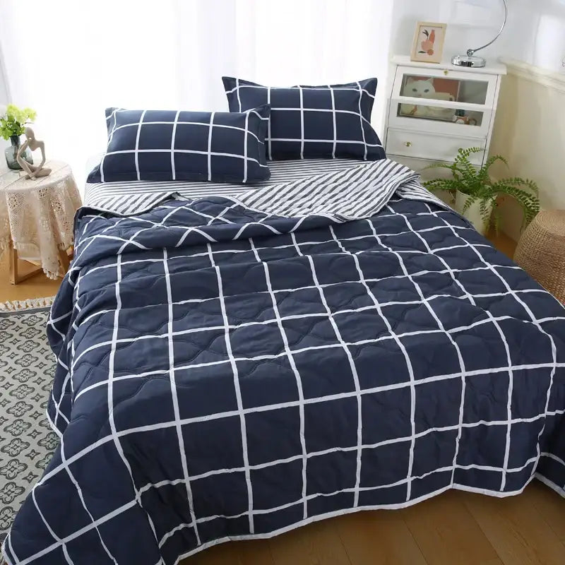 Navy blue and white grid patterned quilt set showcasing decorbites daisy print for bedroom diamond quilted bedding