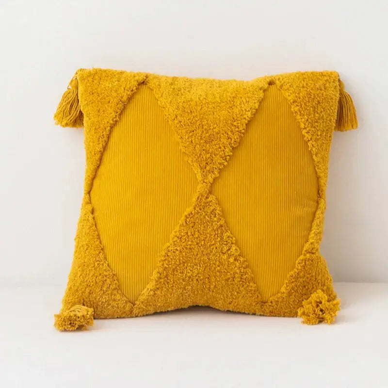 Vibrant mustard-yellow diamond tassel cushion cover with plush tassels and textured design for living room decor