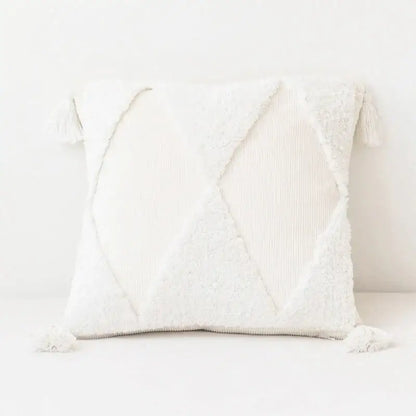 White textured cushion cover with geometric patchwork and tassels for a mint green diamond tassel cushion cover
