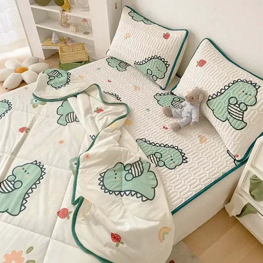 Mint green dinosaur summer quilt and latex fitted sheet set with soft textured surface and teal piping accents