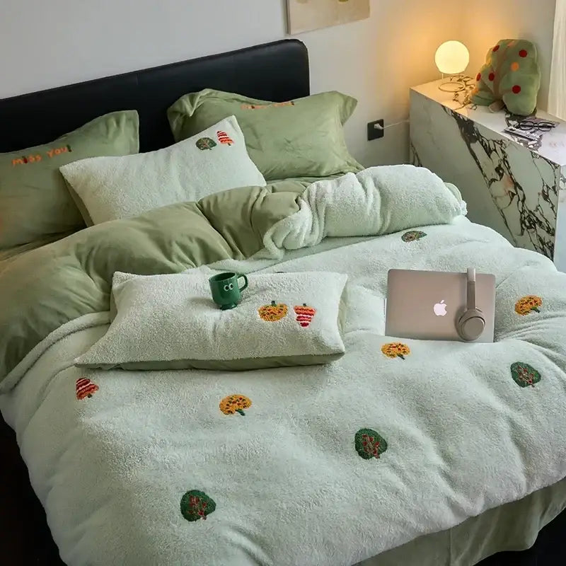 Soft mint green plush duvet set with embroidered carrot and leaf patterns made of matte ant velvet for bedroom use