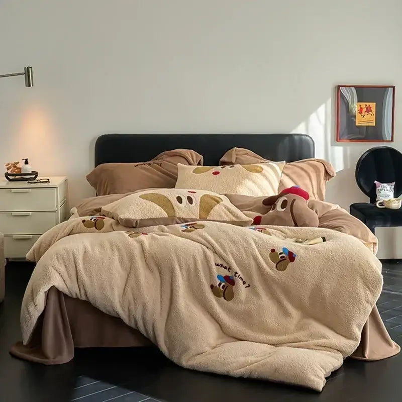 Beige plush fleece duvet set with embroidered cartoon dog faces and brown tan accents in matte ant velvet style