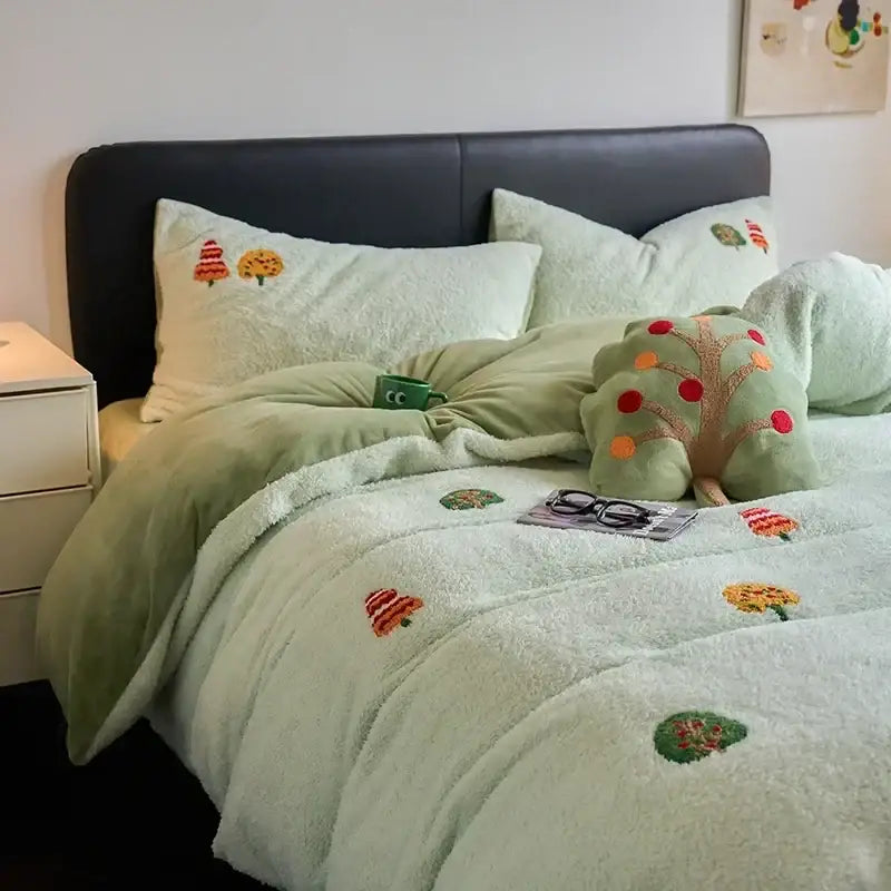Soft mint green matte ant velvet duvet set with embroidered tree and autumn leaf motifs for bedroom use