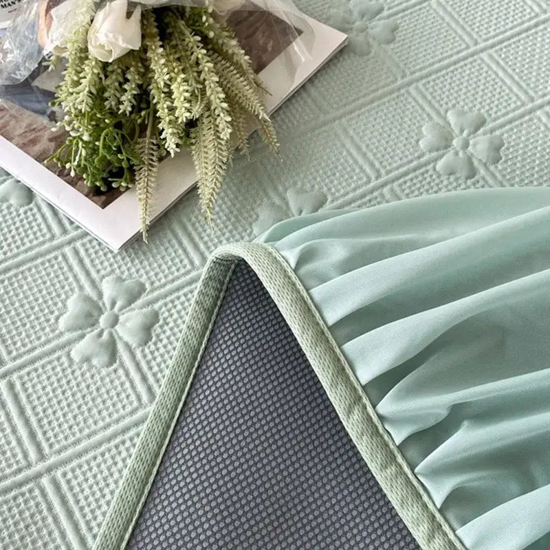 Light green quilted cooling bed skirt set with floral pattern and breathable mesh backing for bedroom mattress mat