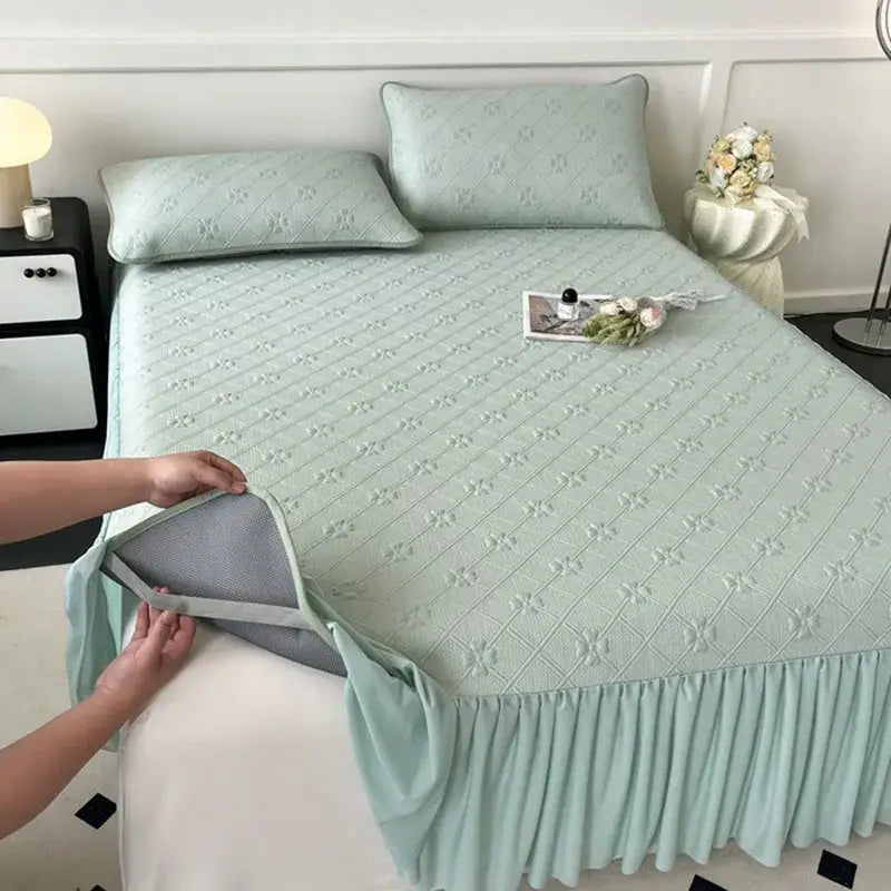 Light mint green floral quilted bed skirt set with ruffled hem and breathable mesh lining for bedroom mattress mat