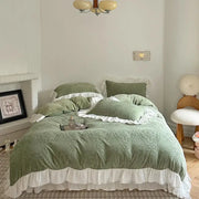 Mint green embroidered bedding set with white ruffled trim in decorbites french carved velvet for elegant bedroom decor