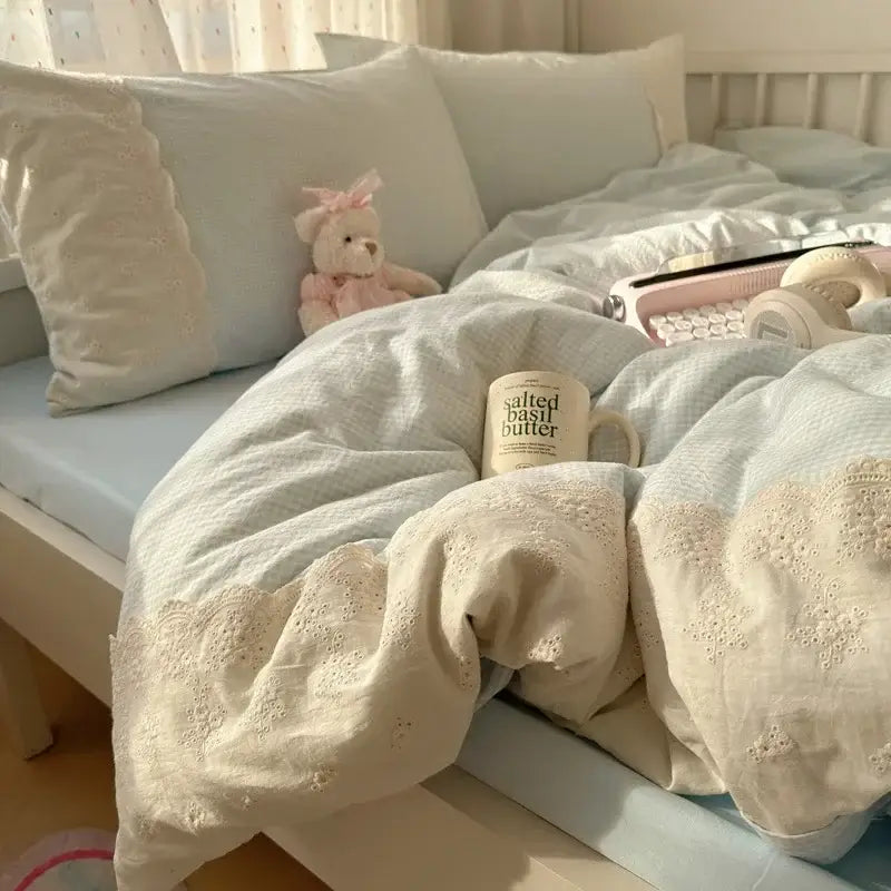 Cream-colored embroidered duvet cover with delicate lace detailing from mint green french lace washed cotton bedding sets decorbites french lace