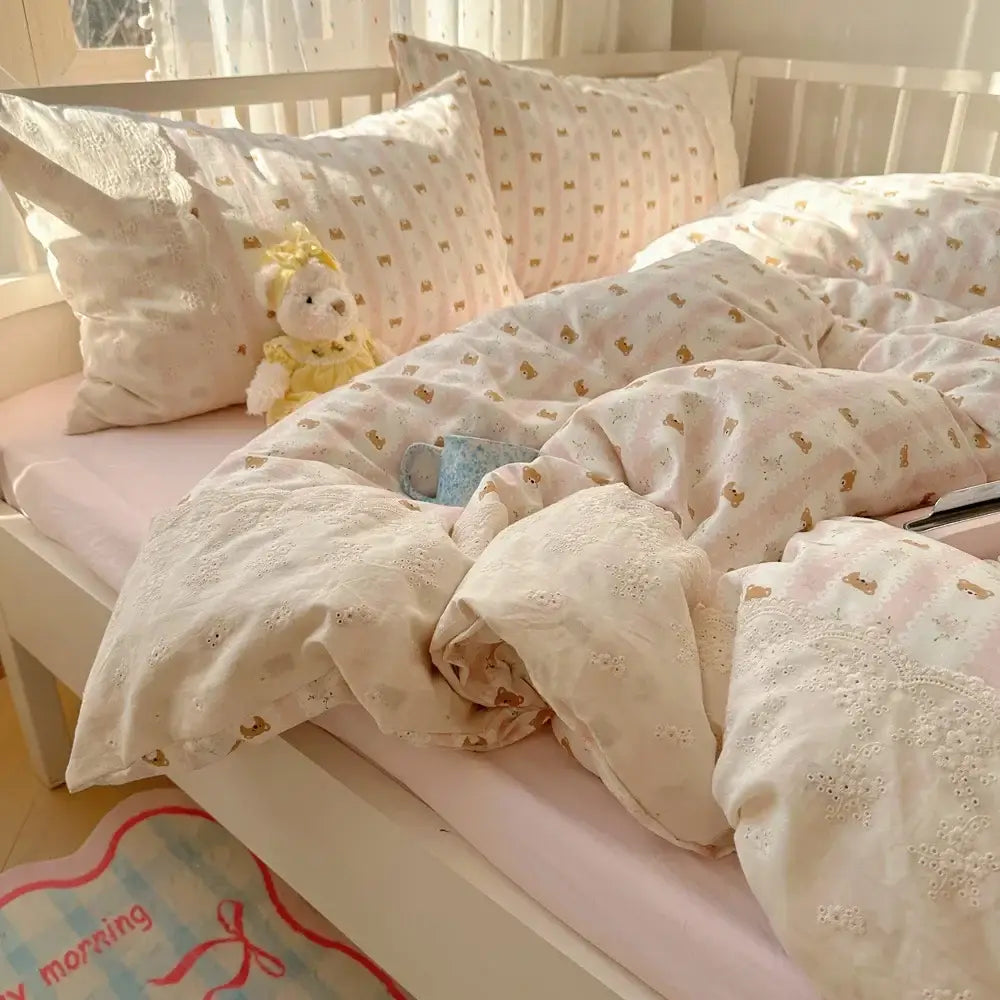 Soft cream-colored bedding sets with delicate gold bear prints and lace trim in mint green french lace washed cotton