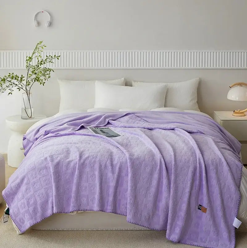 A soft lavender jacquard milk velvet throw blanket with quilted pattern and stitched edges for decorbites jacquard milk use