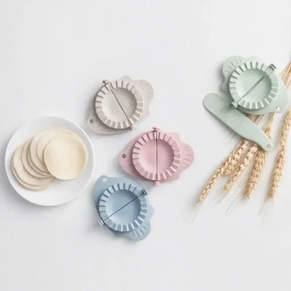 Mint green leaf silicone dumplings maker tool with scalloped edges and central divider for easy dumplings making