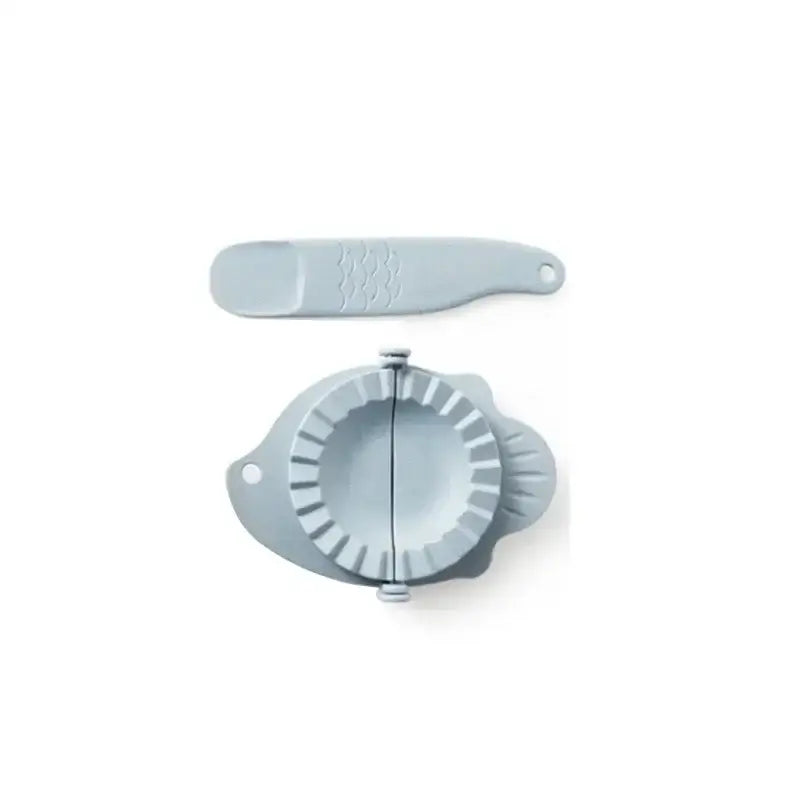 Light gray silicone dumplings maker tool with matching flat tool embossed with wave patterns for kitchen use