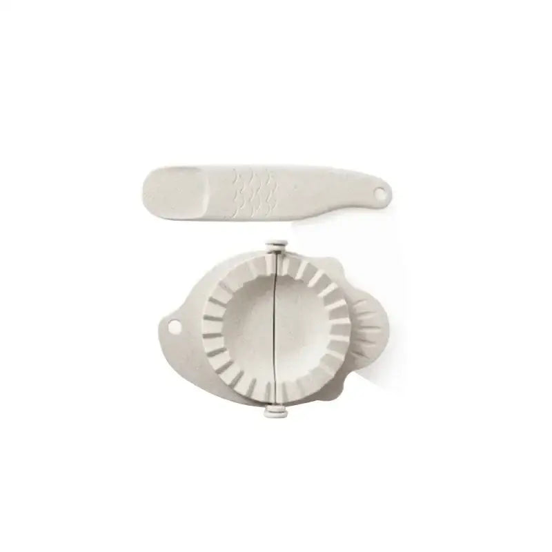 White silicone dumplings maker tool with fluted edge and handle for easy kitchen use