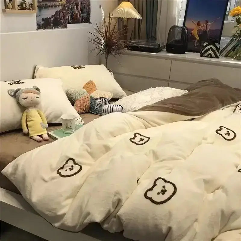 Cream-colored quilted duvet cover with embroidered brown bear faces in mint green and white ginkgo leaf cartoon print bedding set decorbites cartoon print