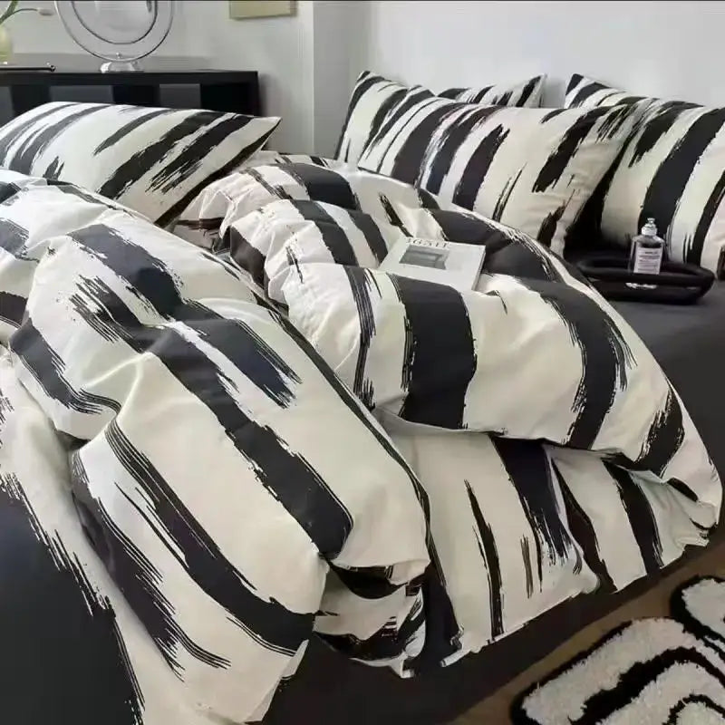 Black and white brushstroke-patterned bedding set complementing mint green and white ginkgo leaf cartoon print decorbites cartoon print