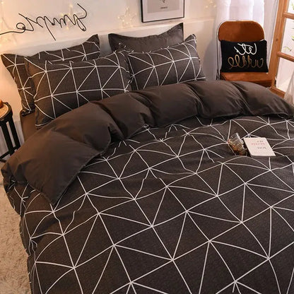 Dark gray bedding set with modern white geometric triangle pattern complementing mint green white cartoon print decorbites bedding set