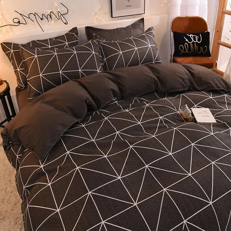 Dark gray bedding set with modern white geometric triangle pattern complementing mint green white cartoon print decorbites bedding set