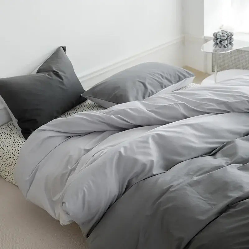 Gray duvet cover and matching pillows with soft texture complement mint green and white ginkgo leaf cartoon print bedding set decorbites cartoon print