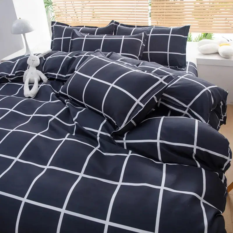Navy blue and white grid-patterned bedding set complementing mint green and white ginkgo leaf cartoon print decorbites cartoon print