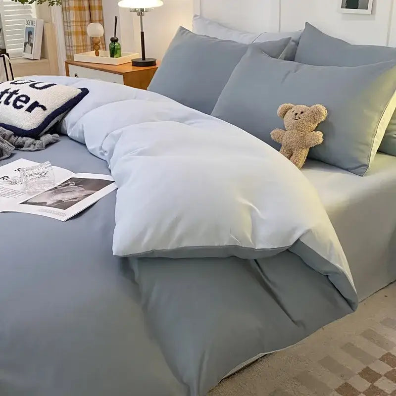 Soft blue quilted duvet bedding set with matching pillows and plush teddy bear in mint green and white ginkgo leaf cartoon print decorbites cartoon print bedroom